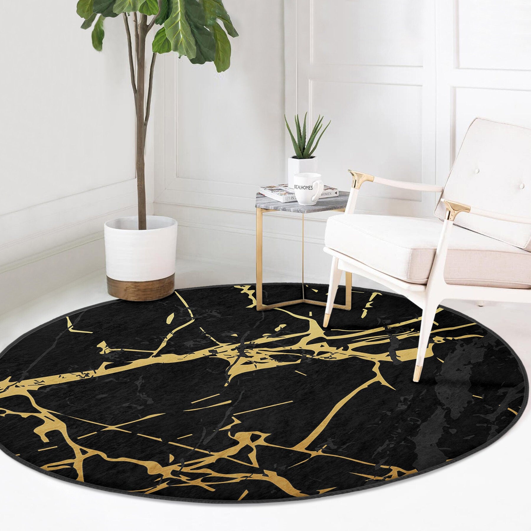 Modern white armchair beside round black rug with gold abstract lines in bright living room