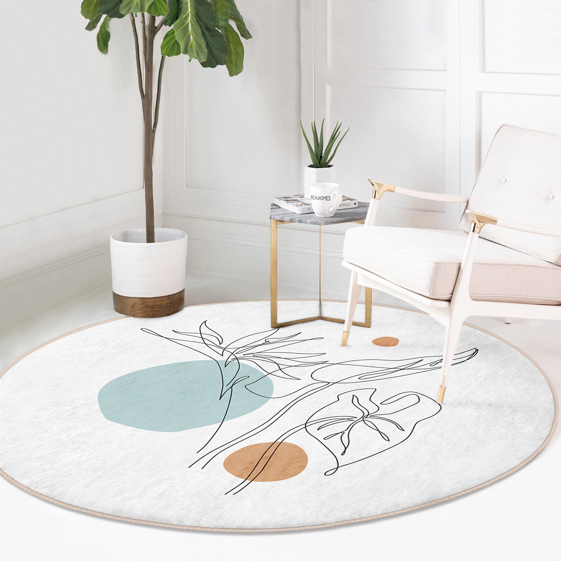 Modern minimalist living room with white armchair, round abstract rug, side table, and potted plant